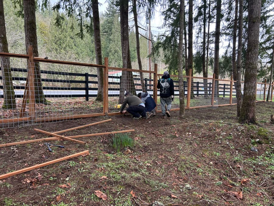 Wood fence with gate installation