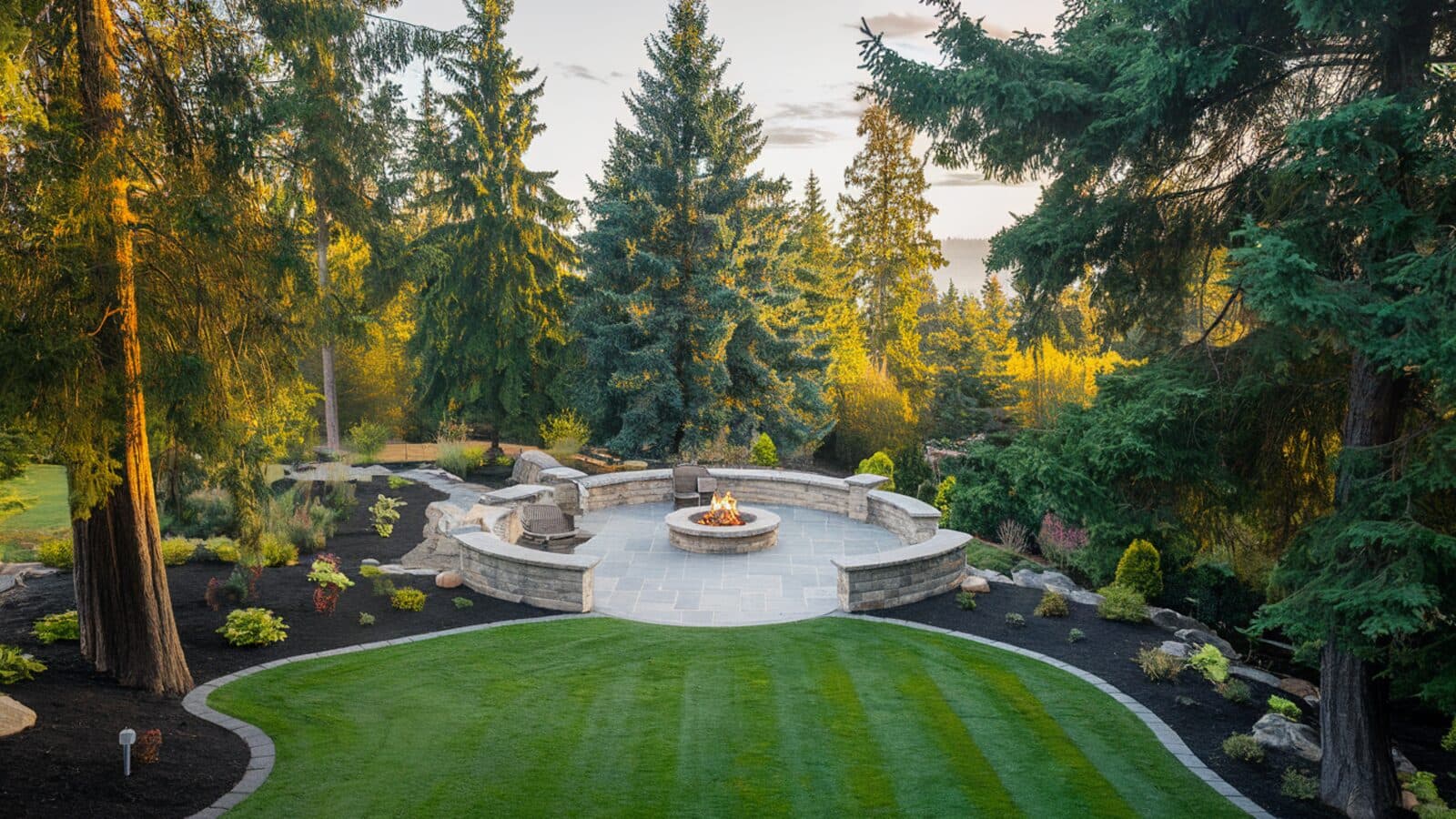 Beautifully landscaped outdoor patio and hardscape on Whidbey Island by Whidbey Island Landscaping